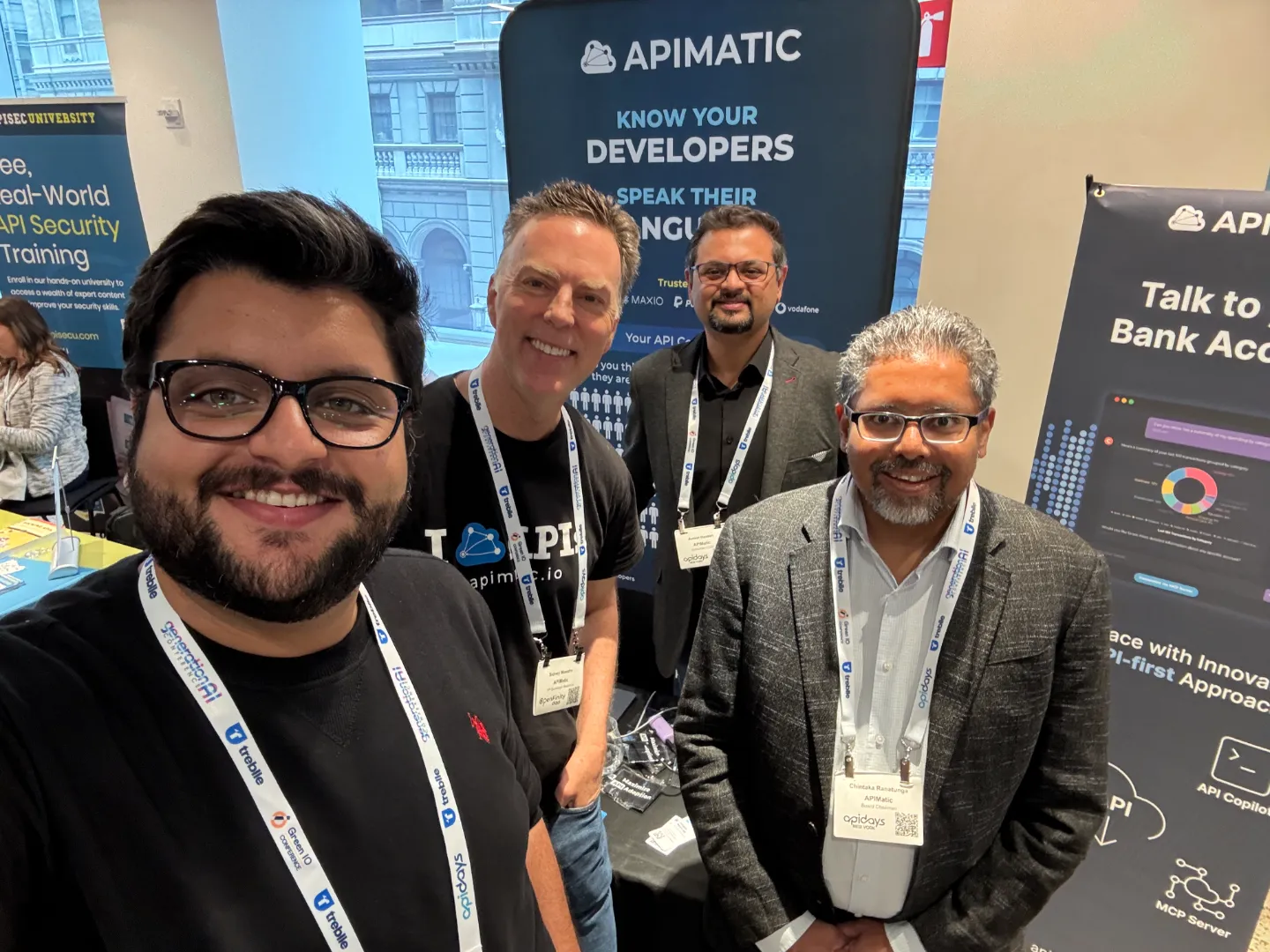 Abdul Hannan Shaikh with three colleagues at the APIMatic stand at apidays